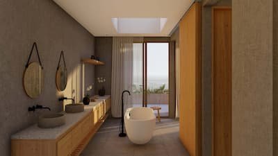 Baño con vista al mar, acabados nobles, diseño sensorial para máximo bienestar